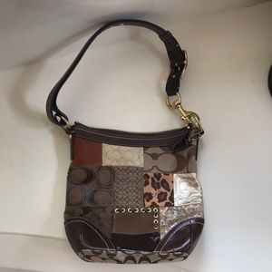 Coach monogrammed shoulder bag.
